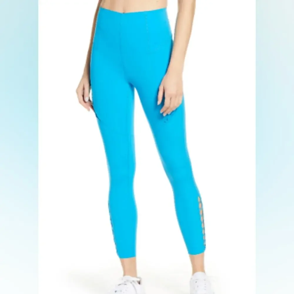 NIKE Dri fit Bungee Detail workout leggings In Aqua Blue XS